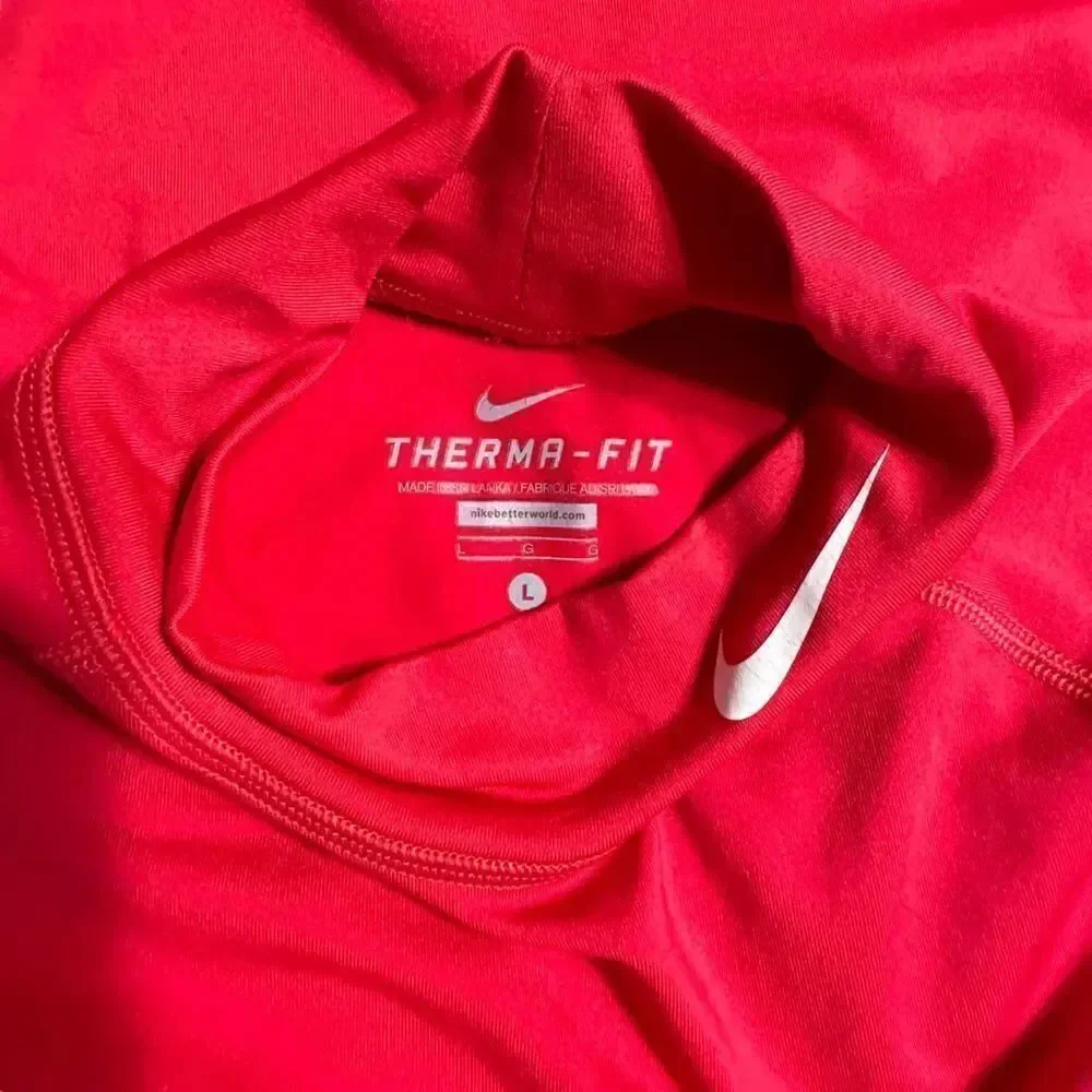 Nike deep pink Therma fit turtle neck